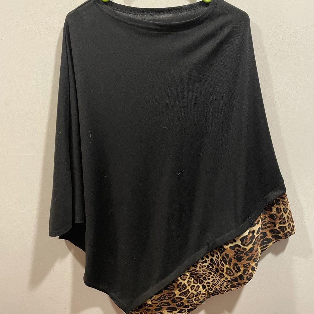 Black poncho with cheetah